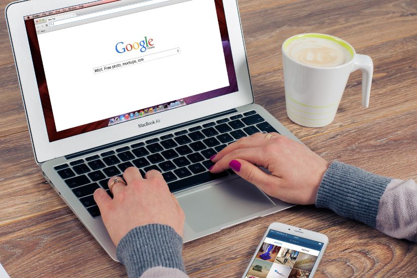 By focusing on SEO, your blog’s authority will grow over time. Woman in front of a laptop