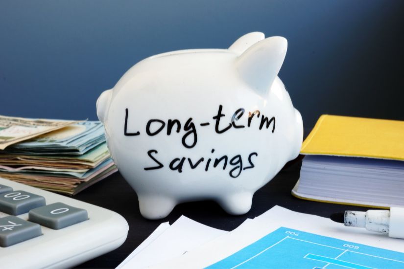 The best way to solve financial problems is to adopt new habits that set you up for long-term success. A savings account growing over time or an infographic about long-term financial planning.